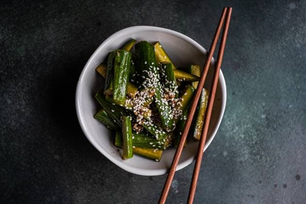 Asian spicy cucumber salad with soy sauce and sesame seeds AnnaBogush_ID13198_402725_001 Copyright: xAnnaxBogushx Model Released