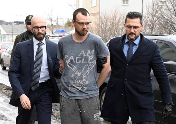 March 14, 2023, AMQUI, PQ, Canada: Steeve Gagnon is escorted by police into court in Amqui, Que., Tuesday, March 14, 2023. Gagnon is facing charges relating to an incident where a driver of a pickup truck drove into pedestrians, killing two people and injuring nine. AMQUI Canada  - ZUMAc35_ 20230314_zaf_c35_100 Copyright: xJacquesxBoissinotx
