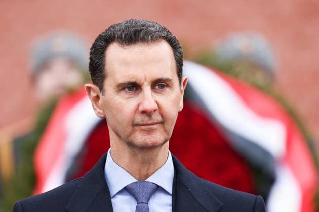 Moskau, Baschar al-Assad zu Gast In Russland RUSSIA, MOSCOW - MARCH 15, 2023: Syria s President Bashar al-Assad is seen during a wreath laying ceremony at the Tomb of the Unknown Soldier by the Kremlin Wall. The Syrian president is on a working visit to Russia. Mikhail Tereshchenko TASS  57876933