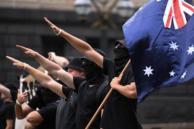 Bilder des Jahres 2023, News 03 März News Themen der Woche KW11 ANTI TRANSPHOBIA RALLY MELBOURNE, Neo-Nazi protesters face-off with transgender rights supporters outside Parliament House in Melbourne, Saturday, March 18, 2023. ( NO ARCHIVING, EDITORIAL USE ONLY, NO USE IN BOOKS WITHOUT CONSENT MELBOURNE VIC AUSTRALIA  Copyright: xJAMESxROSSx 20230318001776303348