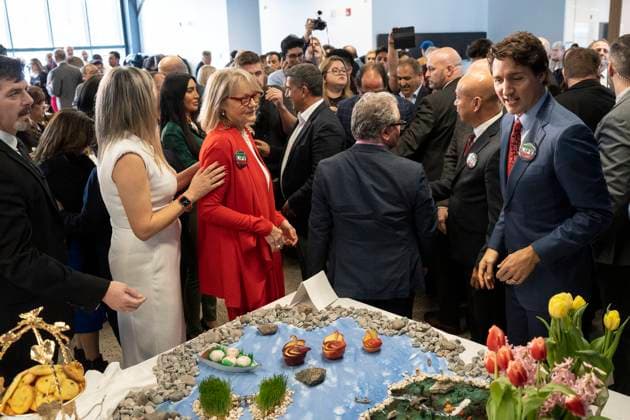March 18, 2023, Aurora, ON, Canada: Prime Minister Justin Trudeau stands next to a table displaying a Ã’Haft-sinO as he attends a Nowruz celebration with members of the Persian community, in Aurora, Ont., on Saturday, March 18, 2023. Aurora Canada  - ZUMAc35_ 20230318_zaf_c35_068 Copyright: xChrisxYoungx