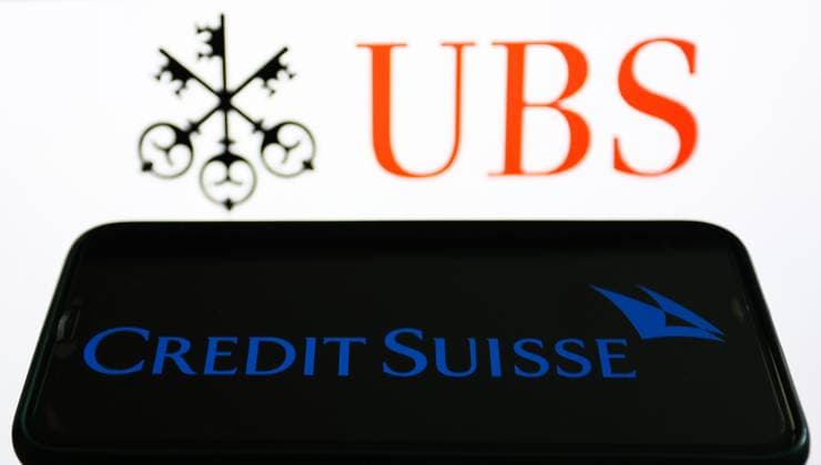 UBS And Credit Suisse Photo Illustrations UBS logo displayed on a laptop screen and Credit Suisse logo displayed on a phone screen are seen in this illustration photo taken in Krakow, Poland on March 19, 2023. Krakow Poland  Copyright: xJakubxPorzyckix originalFilename: porzycki-ubsandcr230319_npJL3.jpg