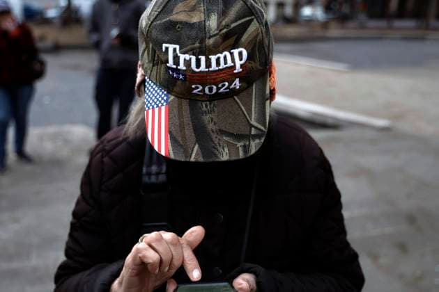 Young Republican Club Stages A Rally In Support Of Donald Trump In Lower Manhattan Several people gather for a protest organized by Young Republicans in front of New York Criminal Court on March 20, 2023 in New York City, USA. Former President of the US, Donald Trump recently posted on social media that he expects to be arrested in connection to an investigation for a hush money payment facilitated by his former attorney Michael Cohen, to a adult film star Stormy Daniels. New York NY United States  Copyright: xJohnxLamparskix originalFilename: lamparski-youngrep230320_npm6h.jpg