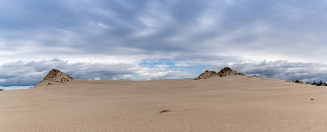 A panorama view of endless wandering sand dunes in Slowinski National Park on the Baltic Sea in northern Poland A panorama view of endless wandering sand dunes in Slowinski National Park on the Baltic Sea in northern Poland Copyright: xZoonar.com NandoxLardix 17568390