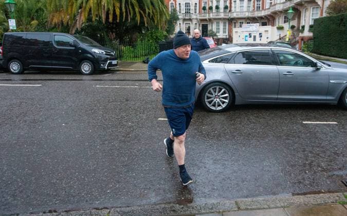 News Themen der Woche KW12 News Bilder des Tages March 22, 2023, London, England, United Kingdom: Former UK Prime Minister BORIS JOHNSON is seen returning home after morning run as he gets ready to appear before House of Commons Privileges Committee over lockdown breaching parties in Downing Street. London United Kingdom - ZUMAs262 20230322_zip_s262_011 Copyright: xTayfunxSalcix