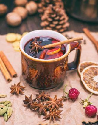 RECORD DATE NOT STATED drink mulled wine in brown ceramic mug on kraft paper, vintage toning , 30782994.jpg, alcohol, anise, aromatic, background, beverage, brown, cardamom, celebration, christmas, cinnamon, citrus, closeup, cup, decoration, drink, dry, festive, food, fruit, grog, holiday, homemade, hot, ingredient, mulled, natural, orange, paper, punch, raspberry, red, rustic, slice, spice, spoon, star, sugar, sweet, table, traditional, vintage, wine, winter, wood, wooden, xmas