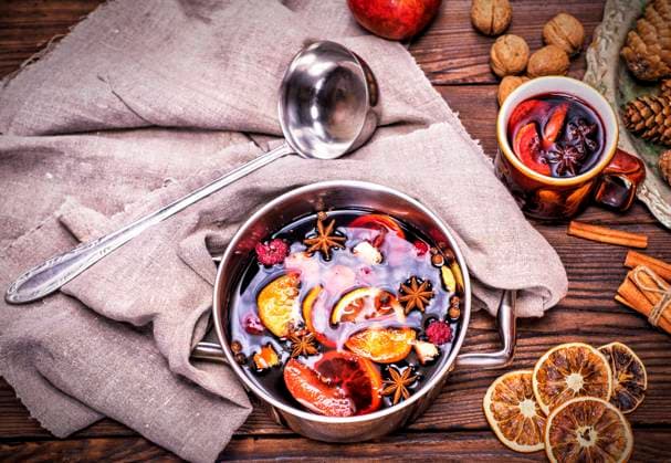 RECORD DATE NOT STATED mulled wine in a saucepan on a brown wooden background, top view , 30783050.jpg, above, alcohol, aluminum, anise, aromatic, background, beverage, casserole, celebration, christmas, cinnamon, citrus, cooking, cuisine, dish, drink, festive, food, grog, holiday, homemade, hot, ingredient, ladle, mulled, nobody, orange, overhead, punch, raspberry, red, rustic, spice, spoon, star, sugar, sweet, table, top view, traditional, vintage, wine, winter, wooden, xmas