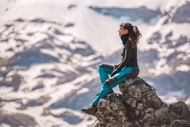 Hiker sitting on rock at sunny day model released, Symbolfoto, PCLF00262