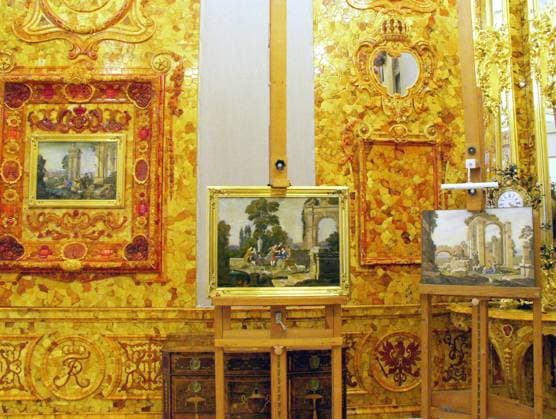 Amber Room restoration Catherine Palace Pushkin 187727 12.01.2003 Restoration of the renowned Amber Room in the Catherine Palace of the Tsarskoye Selo state museum reserve in Pushkin outside St. Petersburg. The south wall is decorated with allegories of senses on Florentine mosaic panels. Present-day artists have restored the Sight, left, and Hearing, right. In the center, the original panel Tactile Sense and Olfaction, recovered from Germany in April 2000 Dmitry Korobeinikov Sputnik Pushkin Leningrad region Russia  Copyright: xDmitryxKorobeinikovx