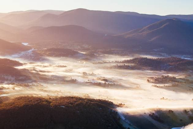 RECORD DATE NOT STATED A view over Healesville at sunrise in the Yarra Valley in Victoria, Australia , 31001104.jpg, agriculture, australia, bright, cold, country, countryside, field, fog, grass, green, healesville, landscape, mist, nature, outdoor, ray, rural, scenic, sky, summer, sun, sunshine, tourism, travel, tree, valley, vibrant, victoria, vine, vineyard, winery, winter, yarra, yarra valley