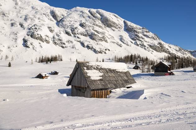 A small hut in a winter landscape, snow, blue sky, cold Bad Mitterndorf Austria