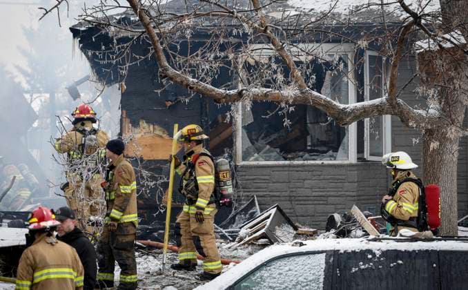 March 27, 2023, Calgary, AB, CANADA: Firefighters attend the scene of a house explosion that injured several people, destroyed one home and damaged others in Calgary, Alta., Monday, March 27, 2023. Calgary CANADA  - ZUMAc35_ 20230327_zaf_c35_095 Copyright: xJeffxMcintoshx