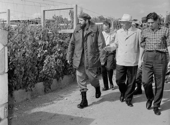 Cuba. December, 1963-January, 1964. Prime minister of Cuba Fidel Castro and Secretary of the Central Committee of the Communist Party of the Soviet Union Nikolai Podgorny (L-R front) visit a farm. The exact date and location of the photograph is unknown. Valentin Sobolev TASS  32435517