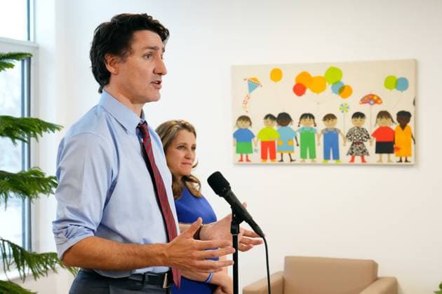 March 29, 2023, Ottawa, ON, CANADA: Deputy Prime Minister and Minister of Finance, Chrystia Freeland looks on as Prime Minister Justin Trudeau speaks at a press conference after meeting with families at a local child care centre in Ottawa, Wednesday, March 29, 2023. Ottawa CANADA  - ZUMAc35_ 20230329_zaf_c35_086 Copyright: xSeanxKilpatrickx
