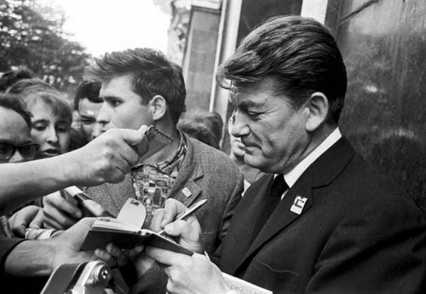 Moscow, USSR. July, 1963. French actor Jean Marais (R) signs autographs for his fans during the 3rd International Film Festival in Moscow. The exact date of the photograph is unknown. Valentin Mastyukov, Viktor Budan TASS  5401600