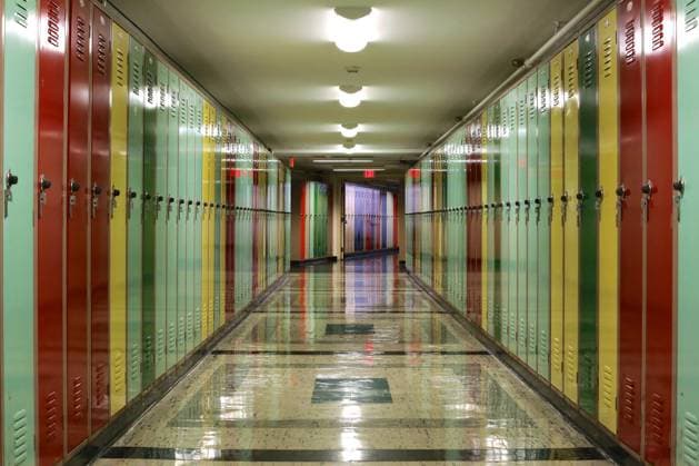 Hallway Lined with Lockers Tunnel-like hallway lined with multi-colored lockers. Copyright: xZoonar.com JannisxWernerx 5740806