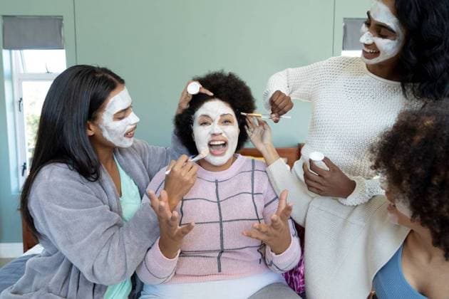 Biracial young females applying beauty cream on cheerful friend s face with afro hair screaming Biracial young females applying beauty cream on cheerful friend s face with afro hair screaming. Skin care, pampering, unaltered, friendship, togetherness, lifestyle and home concept., model released, , property released, Cape Town, South Africa, 2022-04-11T22:00:00.000Z, 3739313.jpg, people,biracial,young female,applying,beauty,cream,cheerful,friend,face,afro hair,screaming,skin,care,pampering,unaltered,friendship,togetherness,lifestyle,home,young,portrait,happy,adult,person,attractive,smile,happiness,beautiful,health,pretty,cute,healthy,hair,smiling,treatment,body,fun,together,female,afro Mid Adult,Woman,Female,Mixed-Race,Young Adult