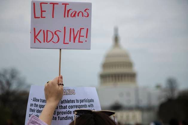DC March For Queer And Trans Youth Autonomy A demonstrator holds a sign during a queer & transgender youth rally near the U.S. Capitol in Washington, D.C. on March 31, 2023, calling for autonomy following recent legislation and threats of violence directed towards transgender people. Washington, D.C. United States  Copyright: xBryanxOlinxDozierx originalFilename: dozier-dcmarchf230331_npufV.jpg