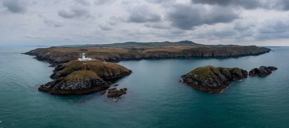 aerial panorama landscape of the Pembrokeshire coast with the historic Strumble Head Lighthouse aerial panorama landscape of the Pembrokeshire coast with the historic Strumble Head Lighthouse Copyright: xZoonar.com NandoxLardix 19242331