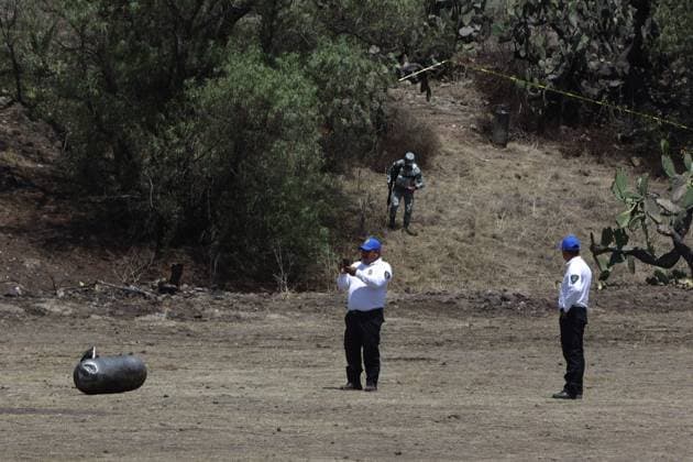 April 1, 2023, State of Mexico, Mexico: National Guard and Experts investigate the crash area, where a hot air balloon caught fire in mid-flight in the Teotihuacan archaeological zone, 2 persons died and a minor was injured as a result of of the tragic accident. on April 1, 2023 in the State of Mexico, Mexico. Teotihuacan Mexico - ZUMAe321 20230402_zia_e321_056 Copyright: xMarianaxBaex