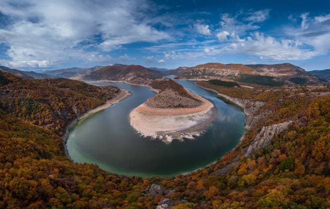 An autumn landscape view of the Arda River Bend near Kardzhali in Bulgaria An autumn landscape view of the Arda River Bend near Kardzhali in Bulgaria Copyright: xZoonar.com NandoxLardix 19335697