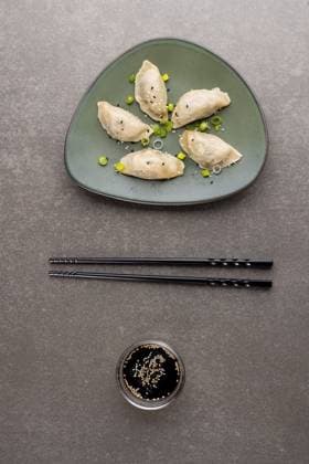 IMAGO Creative, Food, Dumplings Overhead view of dumplings, soy sauce and chopsticks on grey background Overhead view of dumplings, soy sauce and chopsticks on grey background. Asian tasty home cooked food and healthy eating., model released, , property released, Cape Town, South Africa, 14.07.2022, 3766877.jpg, overhead view,dumpling,soy sauce,chopstick,grey background,asian,tasty,home,cooked,food,healthy eating,delicious,meal,gourmet,fresh,cuisine,dinner,snack,lunch,cooking,sweet,diet,nutrition,healthy,dessert,dish,organic,ingredient,eat,fruit,meat,overhead,view,soy,sauce,grey,background,eating