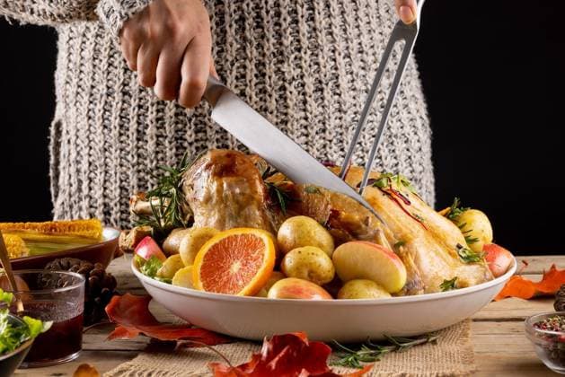 Close up of caucasian woman carving thanksgiving roast turkey with vegetables Close up of caucasian woman carving thanksgiving roast turkey with vegetables. Thanksgiving, autumn, fall, american tradition and celebration concept., model released, , property released, Cape Town, South Africa, 2022-07-12T22:00:00.000Z, 3771588.jpg, people,close,caucasian woman,carving,thanksgiving,roast,turkey,vegetable,autumn,fall,american,tradition,celebration,concept,holiday,season,decoration,traditional,roasted,food,background,design,vegetarian,seasonal,symbol,pumpkin,red,party,festive,meal,fresh,dinner,caucasian,woman Mature Adult,Woman,Female,White