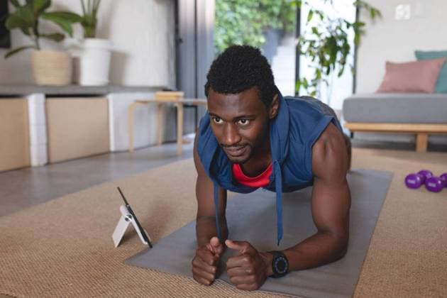 Happy african american man exercising, using tablet in living room Happy african american man exercising, using tablet in living room. Spending quality time at home alone., model released, , property released, Cape Town, South Africa, 2022-09-14T22:00:00.000Z, 3832479.jpg, people,happy,african american,man,exercising,using tablet,living room,spending,quality time,home,alone,young,lifestyle,house,person,smile,room,sofa,adult,fun,apartment,cheerful,cute,portrait,indoors,happiness,smiling,interior,attractive,frontal,african,american,using,tablet,living,quality,time Young Adult,Man,Male,Black