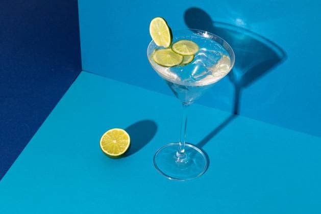 Glass of cocktail with line in blue space Glass of cocktail with line in blue space. Drinks, cocktails, alcohol, beverages and party concept., model released, , property released, Cape Town, South Africa, 2022-12-04T22:00:00.000Z, 3937601.jpg, glass,cocktail,line,blue,space,drink,alcohol,beverage,party,concept,refreshment,liquid,bar,abstract,background,design,light,illustration,juice,graphic,white,modern,celebration,restaurant,color