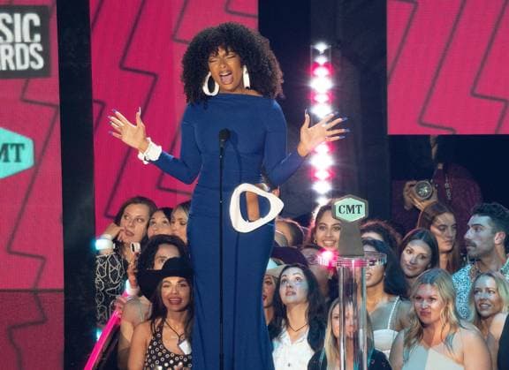 April 2, 2023, Austin, TX, USA: Megan Thee Stallion presents the CMT EQUAL PLAY award, speaks onstage during the 2023 CMT Music Awards at Moody Center on April 02, 2023 in Austin, Texas. Austin USA - ZUMAs181 20230402_zea_s181_189 Copyright: xAmyxPricex
