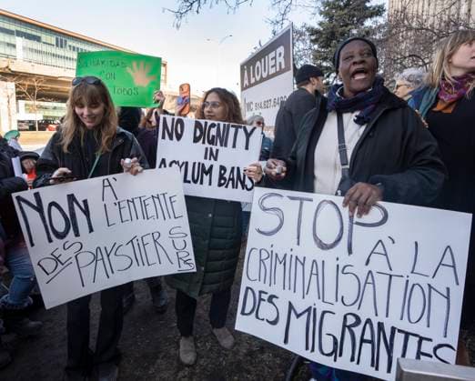 April 4, 2023, Montreal, PQ, Canada: Refugees and their supporters call for open borders as they take part in a protest in front of Prime Minister Justin Trudeau s riding office, in Montreal, Tuesday, April 4, 2023. Montreal Canada  - ZUMAc35_ 20230404_zaf_c35_052 Copyright: xRyanxRemiorzx