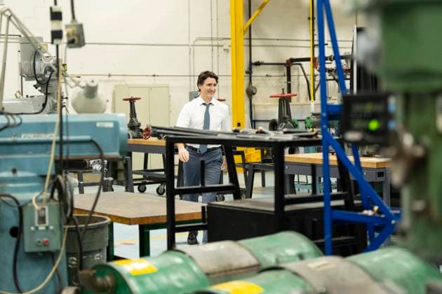 April 5, 2023, Whitby, ON, Canada: Prime Minister Justin Trudeau walks through a workshop before holding a local townhall with students from Durham College, in Whitby, Ont. on Wednesday, April 5, 2023. Whitby Canada  - ZUMAc35_ 20230405_zaf_c35_216 Copyright: xChrisxYoungx