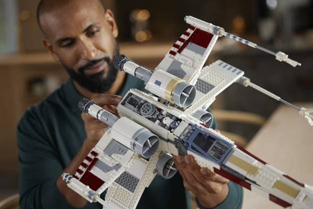 **VIDEO AVAILABLE CONTACT INFO@COVERMG.COM TO RECEIVE** The LEGO Group are releasing an Ultimate Collector Series X-wing Starfighter building set. Based on the iconic T-65 X-wing Starfighter from the Star Wars saga, the new 1,949 piece LEGO Star Wars set is highly detailed and includes the Incom 4L4 fusil thrust engines and the Taim & Bak KX9 laser cannons. The X-wing Starfighter was designed by the Incom Corporation for use by the Rebel Alliance in long missions and dog fights. First seen in Star Wars: A New Hope, the X-wings were manned by elite pilots in the Rebel Alliance including Luke Skywalker. In the same film, the Rebel Alliance deployed the X-wings in the Battle of Yavin, where Luke joins the Red and Gold Squadrons as call-si Copyright: xx 52597186 EDITORIAL USE ONLY. NOT FOR USE BY NEWSPAPERS BASED IN THE UK.