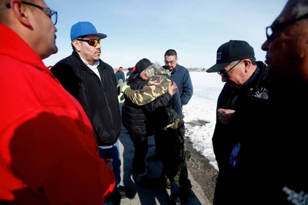 April 6, 2023, Winnipeg, MANITOBA, CANADA: People embrace at a media conference at Winnipegs Brady Landfill just outside the city, Thursday, April 6, 2023. Christopher Traverse, Chief of Lake St. Martin First Nation, and community members spoke about the recent discovery of Linda Beardys body in the landfill. Winnipeg CANADA  - ZUMAc35_ 20230406_zaf_c35_166 Copyright: xJohnxWoodsx