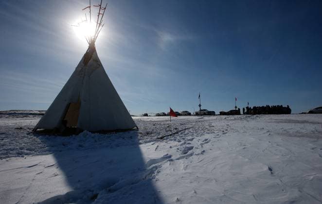 April 6, 2023, Winnipeg, MANITOBA, CANADA: A teepee is shown as Christopher Traverse, Chief of Lake St. Martin First Nation speaks to the media at Winnipegs Brady Landfill just outside the city, Thursday, April 6, 2023. Traverse and community members spoke about the recent discovery of Linda Beardys body in the landfill. Winnipeg CANADA  - ZUMAc35_ 20230406_zaf_c35_170 Copyright: xJohnxWoodsx