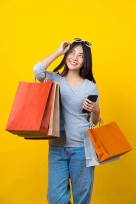 RECORD DATE NOT STATED Attractive Asian smiling young woman Carrying a shopping coloful bag, mobile phone and sunglasses on aisolated yellow color background, copy space and studio, black friday season sale concept., model released, , 31389762.jpg, shop, bag, background, discount, smile, girl, adult, color, asian, optimistic, agreement, gesture, asia, laugh, emotion, lady, model, person, looking, isolated, happy, space, copy, female, woman, lifestyle, cheerful, fashion, colorful, confident, copy space, sale, clothes, shopaholic, stylish, customer, shopper, credit, consumer, purchase, upper, mobile, mobile phone, app, application, online shopping, sunglasses