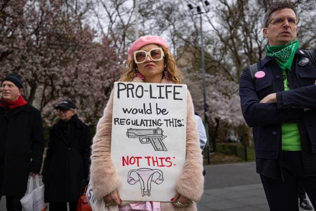 Pro-Choice Protest in NYC NEW YORK, NEW YORK - APRIL 08: A pro-choice activist holds a sign as they take part in a protest after a federal judge in Texas issued a preliminary ruling invalidating the abortion pill mifepristone on April 8, 2023 in New York City. Cities across the U.S. held emergency protests after Judge Matthew J. Kacsmaryk, a Trump appointee, made an initial ruling that could revoke the F.D.A.’s 23-year-old approval of a drug typically used during a medication abortion. New York New York United States Washington Square Park Copyright: MichaelxNigro