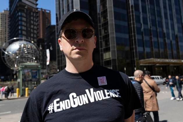 April 9, 2023, New York, New York, USA: A person wears a shirt that reads EndGunViolence. Demonstrators with Rise & Resist, Gays Against Guns and supporters stood in Columbus Circle on Easter Sunday to protest the expulsion of Justin Jones And Justin Pearson from the Tennessee state legislature this week. The two Black Democrats were ousted by the Republican majority legislature for calling for gun law reform in the House after the Nashville school shooting. Gloria Johnson, a White member of the legislature who also protested against gun violence was not expelled. New York USA - ZUMAr174 20230409_znp_r174_034 Copyright: xGinaxMxRandazzox