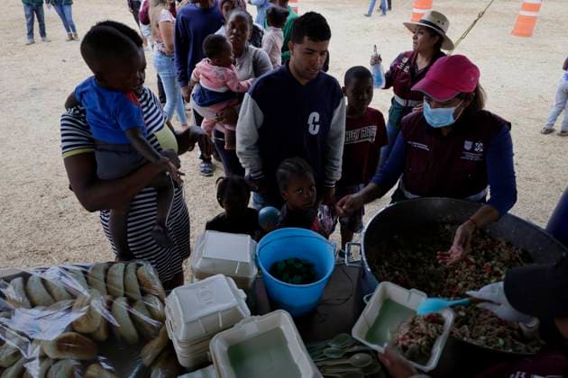 Haitian Migrants Relocated To Shelter In Mexico City Haitian migrants during their lunch hour at the Bosque de Tlahuac facilities in Mexico City, where several people were supported by the National Institute of Migration and the Secretariat for Inclusion and Social Welfare who offered food, lodging, and migration guidance while they are waiting for a permit or Visitor s Card for Humanitarian Reasons that allows them to transit through national territory between 45 and 90 days to continue their journey to the border. Mexico City Mexico City Mexico  Copyright: xGerardoxVieyrax originalFilename: vieyra-notitle230410_npoIP.jpg