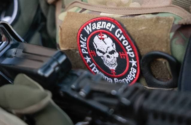 UKRAINE, DONETSK REGION - APRIL 10, 2023: A badge is pictured on a uniform of a Wagner Group soldier in the city of Artyomovsk (Bakhmut). Artyomovsk is located in the Kiev-controlled area of the Donetsk People s Republic. The fight for the city continues. Valentin Sprinchak TASS  58348805