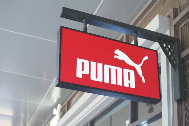 RECORD DATE NOT STATED Samut Prakan, Thailand - June 13, 2020: Logo of Puma in Central Village, Samut Prakan, Thailand. The German multinational corporation that designs and manufactures athletic and casual footwear, , 32163228.jpg, Central Village, Logo, Samut Prakan, Thailand, brand, retail, shop, Puma, shoes, footwear, athletic, casual, Germany, German