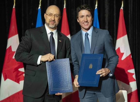 April 11, 2023, TORONTO, ON, CANADA: Ukrainian Prime Minister Denys Shmyhal and Prime Minister Justin Trudeau pose after signing an agreement in Toronto, Tuesday, April 11, 2023. TORONTO CANADA  - ZUMAc35_ 20230411_zaf_c35_035 Copyright: xFrankxGunnx