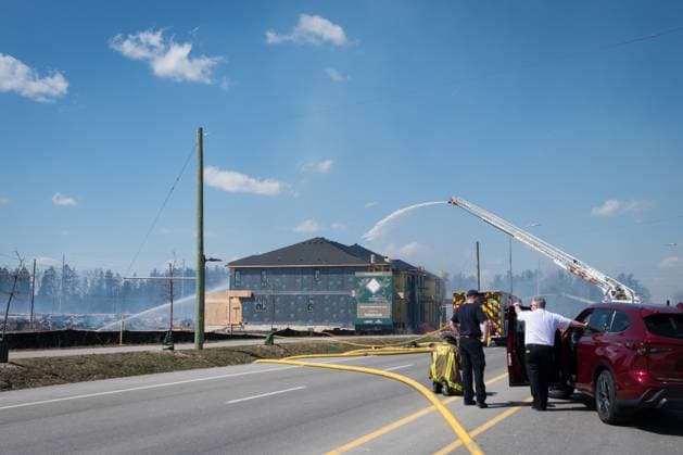 April 12, 2023, Vaughan, ONT, CANADA: First responders are on scene as firefighters battle a large fire in a new housing development area near Pine Heights and Teston Road, in Vaughan, Ont., Wednesday, April 12, 2023. Vaughan CANADA  - ZUMAc35_ 20230412_zaf_c35_037 Copyright: xTijanaxMartinx