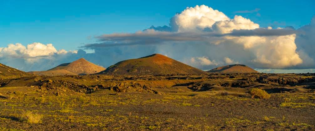 View of volcanic landscape in Timanfaya National Park at sunset, Lanzarote, Las Palmas, Canary Islands, Spain, Atlantic, Europe Copyright: FrankxFell 844-28733