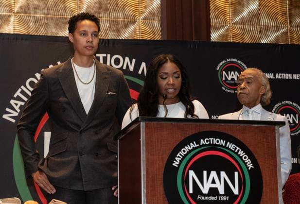 National Action Network 2023 Convention Day 2 Cherelle Griner speaks as Brittney Griner and Al Sharpton watch at Women Empowerment Luncheon at NAN 2023 convention day 2 at Sheraton Times Square. National Action Network holds an annual conference inviting elected official, civil rights leaders and public to speak and participate in conversations about civil and human rights in the USA. New York New York United States Copyright: LevxRadin