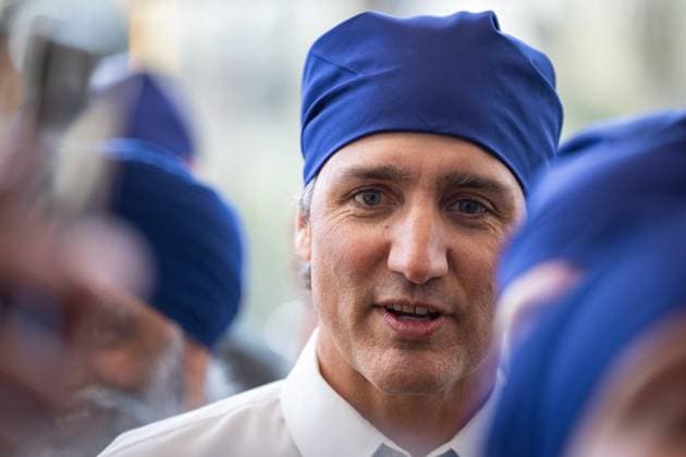 April 14, 2023, VANCOUVER, BC, CANADA: Prime Minister Justin Trudeau visits with members of the Sikh community during Vaisakhi at the Khalsa Diwan Society in Vancouver, on Friday, April 14, 2023. VANCOUVER CANADA  - ZUMAc35_ 20230414_zaf_c35_149 Copyright: xEthanxCairnsx