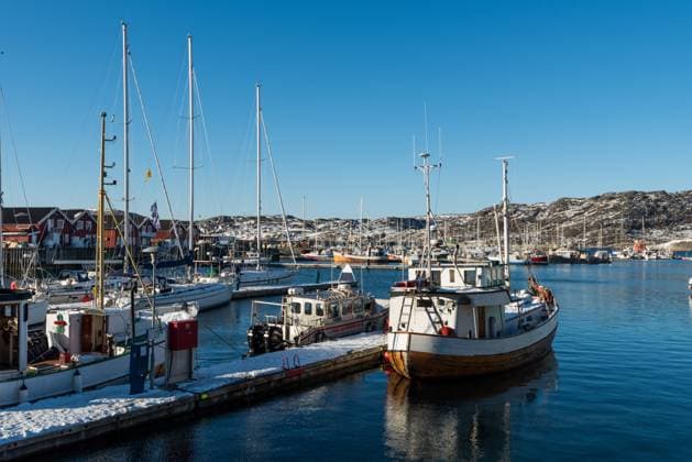 Ships and boats lying in the port of Bodø on clear winter day Ships and boats lying in the port of Bodø on clear winter day Copyright: xZoonar.com ROBERTxRUIDLx 16289083