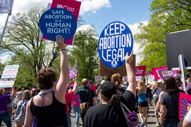 April 15, 2023, Washington, District of Columbia, United State: Activists holding abortion rights signs and shout slogans while joining in a rally. Abortion rights activists rally outside the US Supreme Court in Washington, DC. The Court on April 14 temporarily preserved access to mifepristone, a widely used abortion pill, in an 11th-hour ruling preventing lower court restrictions on the drug from coming into force. Washington United State - ZUMAr125 20230415_zap_r125_007 Copyright: xProbalxRashidx