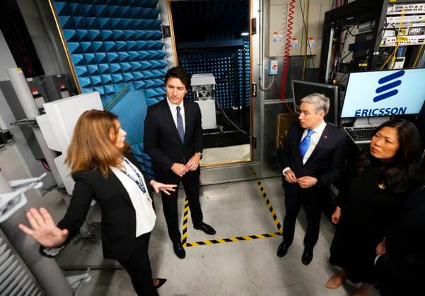 April 17, 2023, Ottawa, ON, CAN: Prime Minister Justin Trudeau and Minister of Innovation, Science and Industry Francois-Philippe Champagne, second from right, and Minister of International Trade, Export Promotion, Small Business and Economic Development Mary Ng, right, are given a tour of a lab at Ericsson prior to holding an announcement and press conference in Ottawa on Monday, April 17, 2023. Ottawa CAN - ZUMAc35_ 20230417_zaf_c35_014 Copyright: xSeanxKilpatrickx
