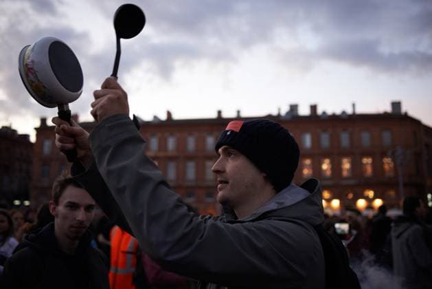 Pot Concert During Macron s Speech On Tvs And Radios A few thousands people gathered in front of the Capitole in Toulouse for a pot concert at the same French President Macron spoke on TVs and radios. They are angered by the decision to validate the pension bill by the consitutional council and its promulgation by Macron soon after. The pension bill will delay retirement by two years to 64 and was pushed through parliament by the government without a vote.Polls show 64% french people say they want the stirkes to intensify and that 93% of workers oppose the pension reform. The retirement age would be raised to 64 years (for 43 years of continued work) and the pensions will be lower specially for women, short careers and low wages people. T  Copyright: xAlainxPittonx originalFilename: pitton-notitle230417_npJNi.jpg